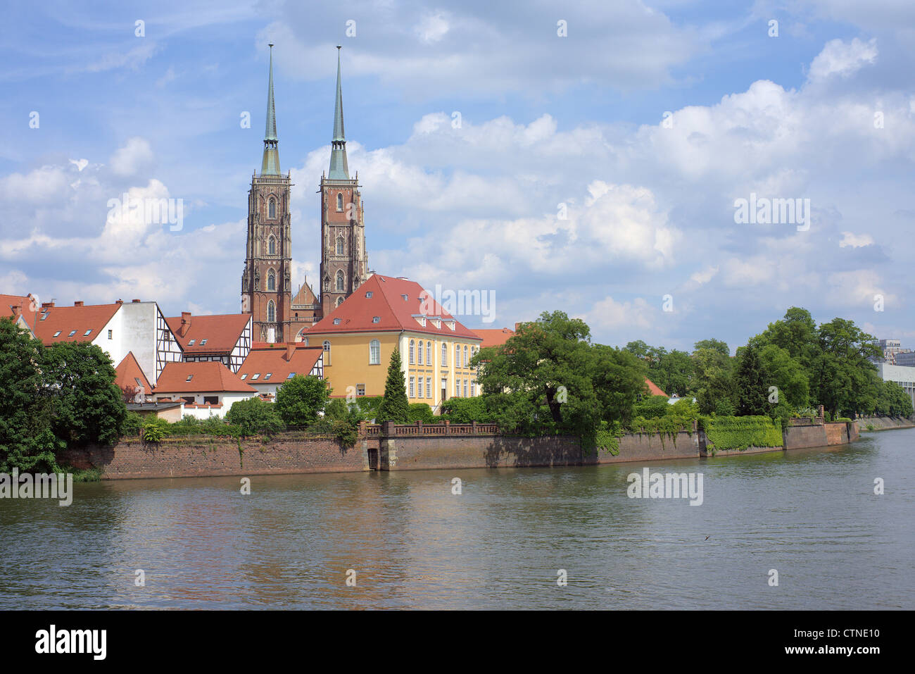 Saint John gothic cathedral Odra river Archbishop's residence in a sunny spring day Ostrow Tumski  Wroclaw Lower Silesia Poland Stock Photo