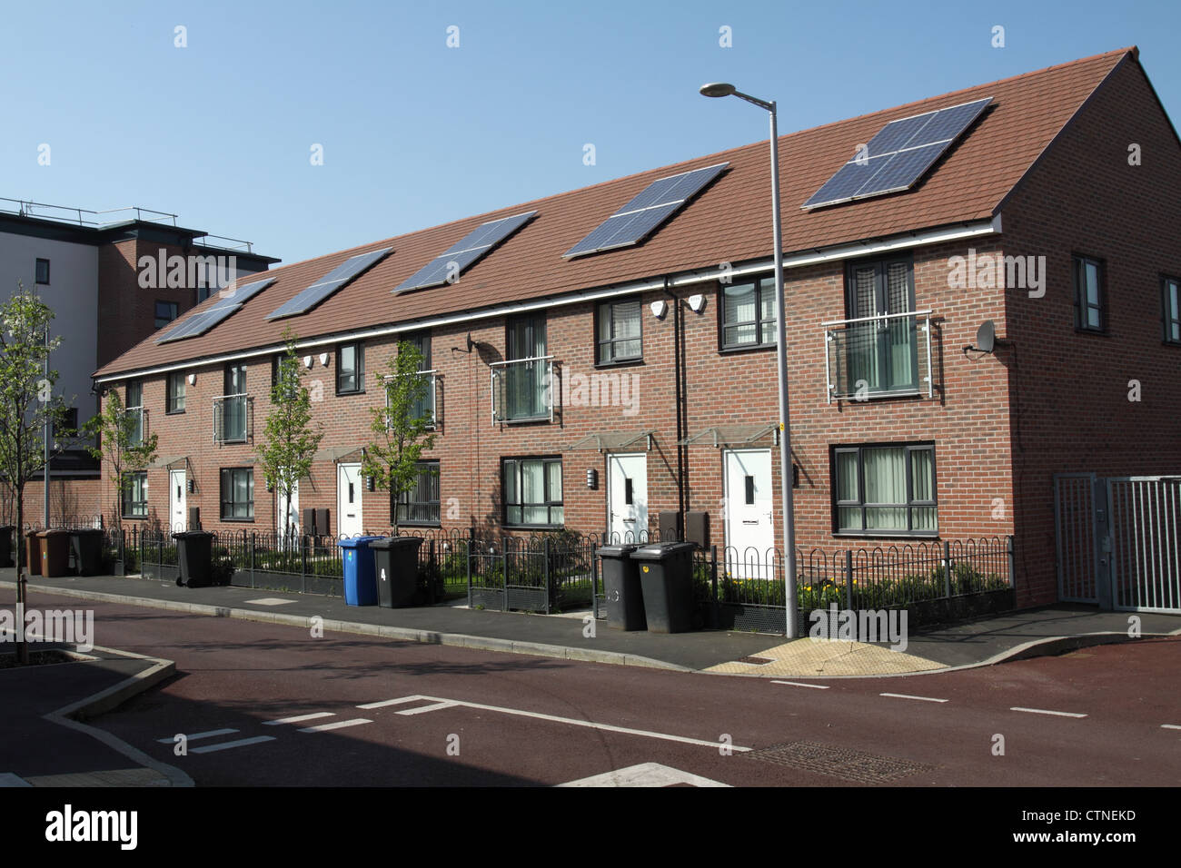 Urban Housing Renewal in Salford, Manchester, Low energy sustainable buildings with high insulation and solar panels. Stock Photo