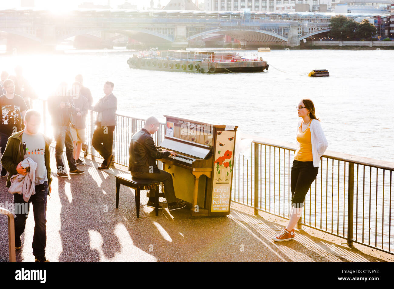 'Play Me, I'm Yours' an art installation project by artist Luke Jerram. This piano was placed outside Tate Modern London. Stock Photo