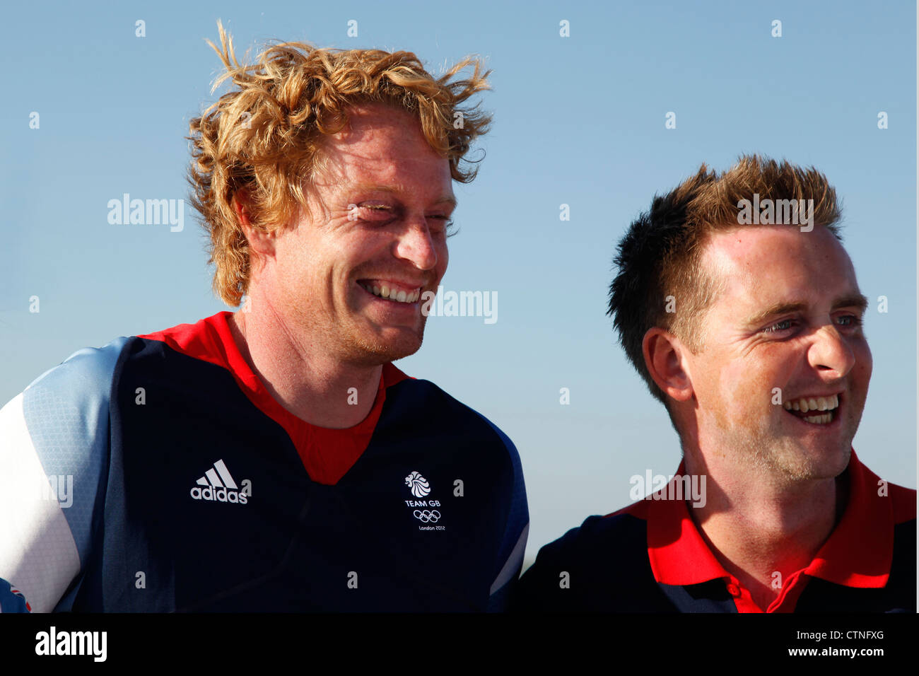 London 2012 Olympian Sailors:  Ben Rhodes and Steve Morrison from Team Great Britain being interviewed at Weymouth Beach Stock Photo