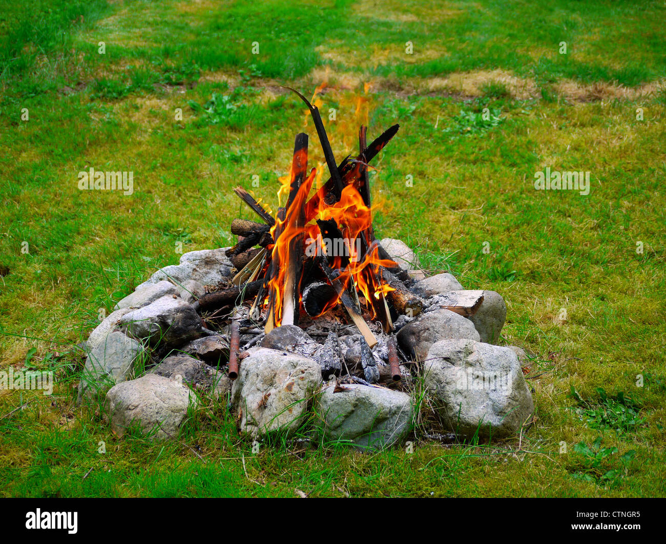 Summer camp fire at the cabin Stock Photo - Alamy