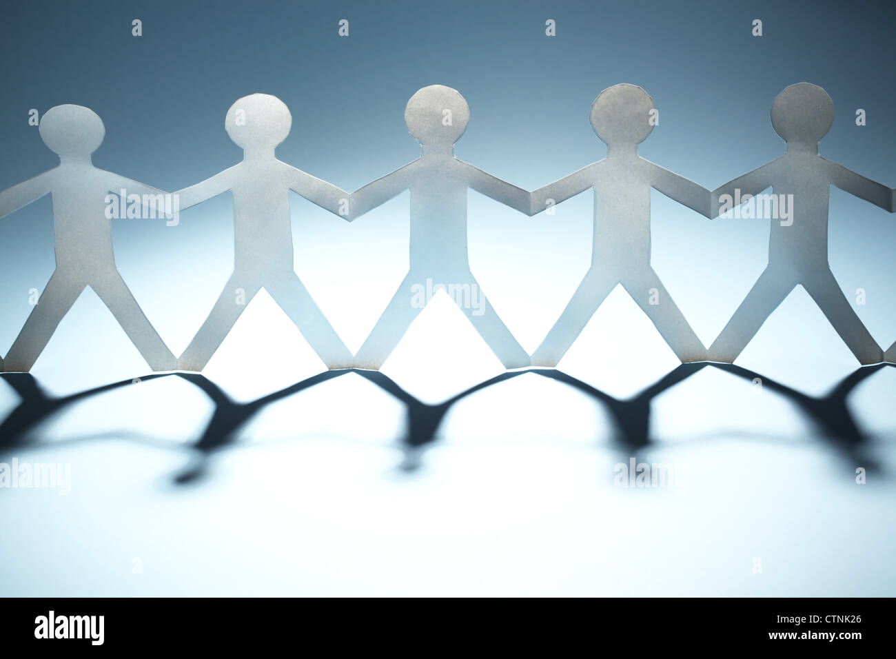 Group Of People Holding Hands Silhouette