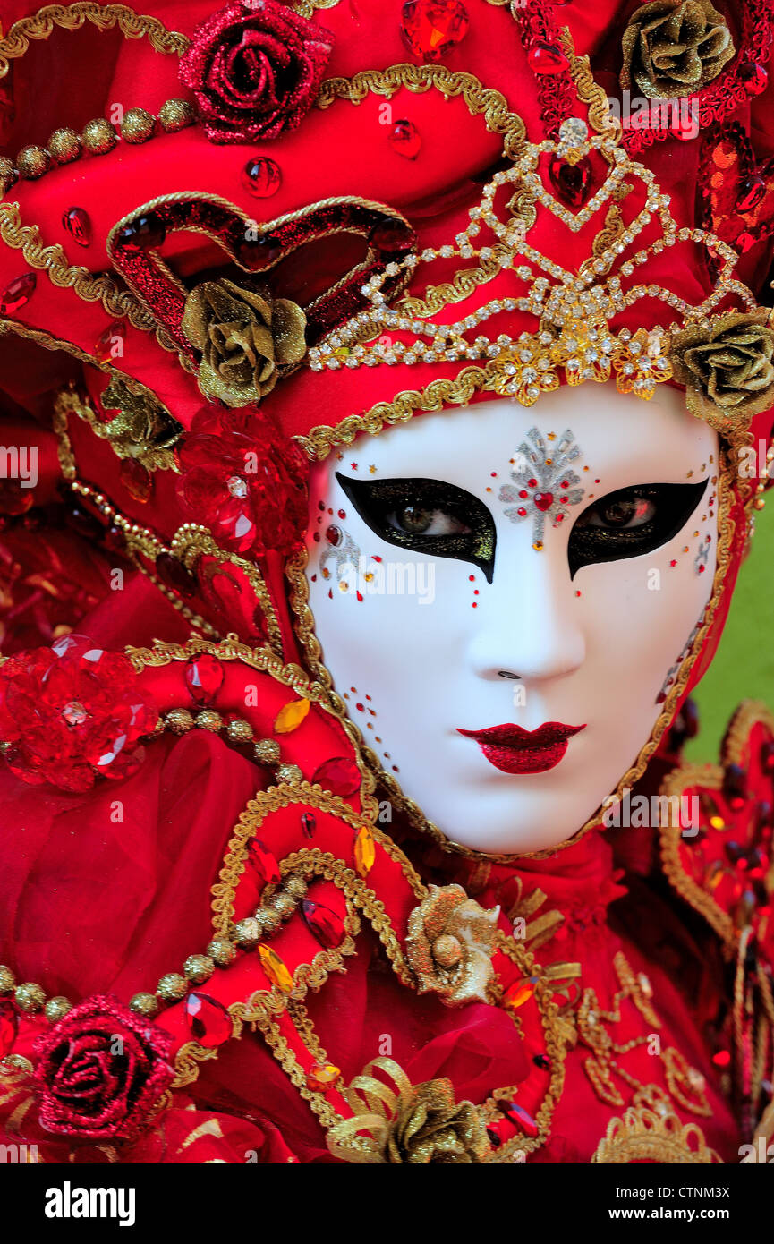 Masked participant during Carnival on Burano Island, Venice Stock Photo