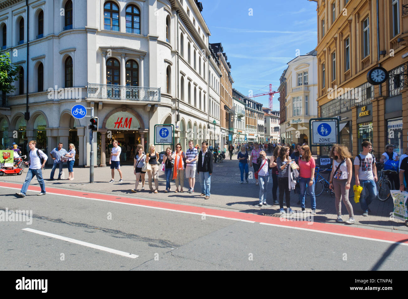 Pedestrians on the main street of the historical Old Town of Heidelberg  Germany Europe - H&M fashion shop Stock Photo - Alamy