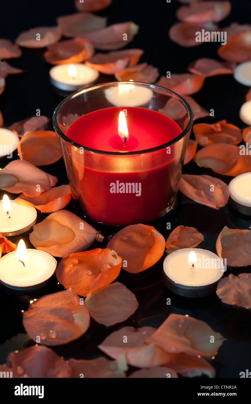 Rose petals and candles Stock Photo Alamy