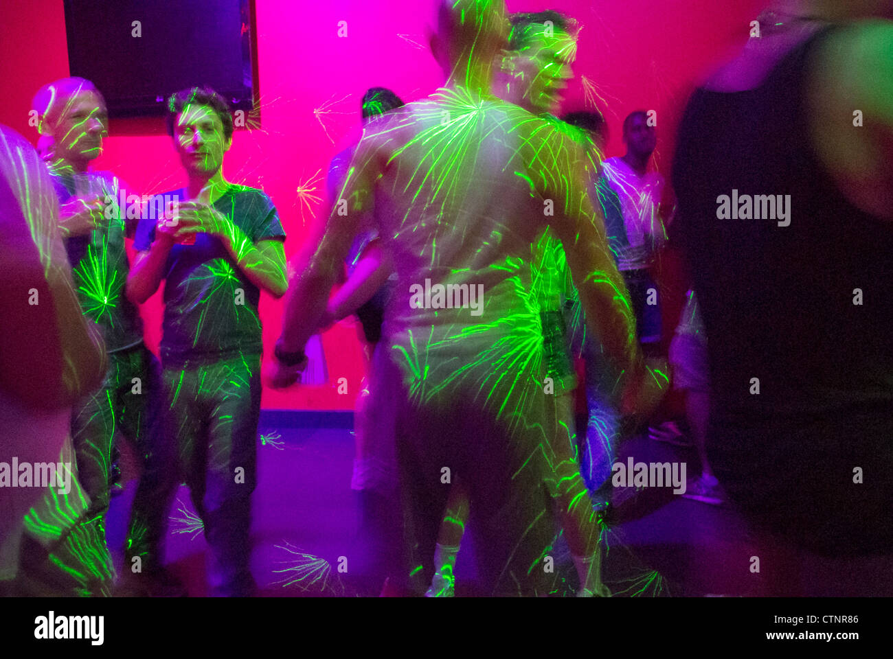 Paris, France Crowd, Gay Men Dancing in Dance Floor inside