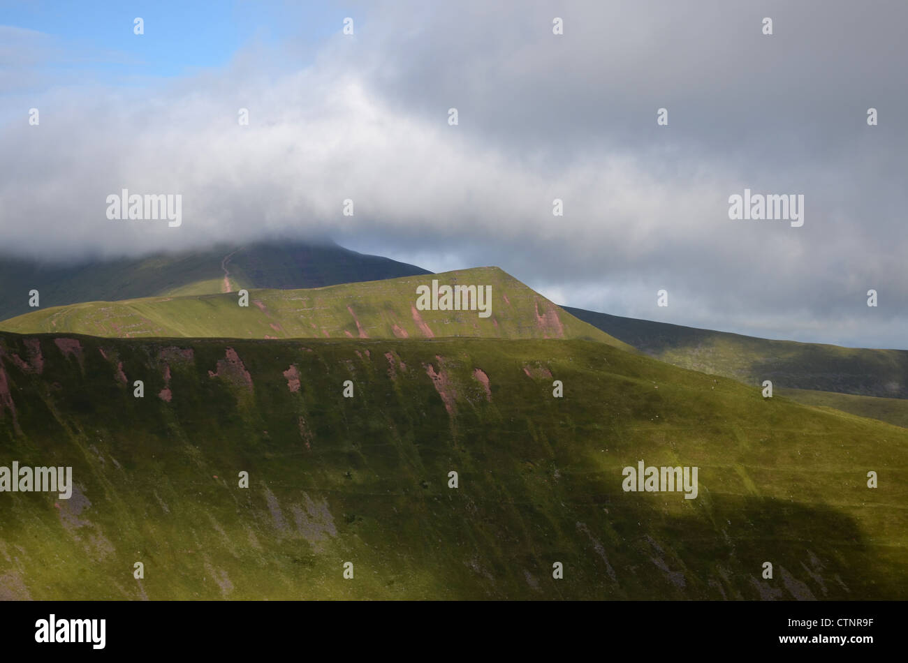 Y Cribyn in sun with Pen y Fan in thick cloud number 3196 Stock Photo ...