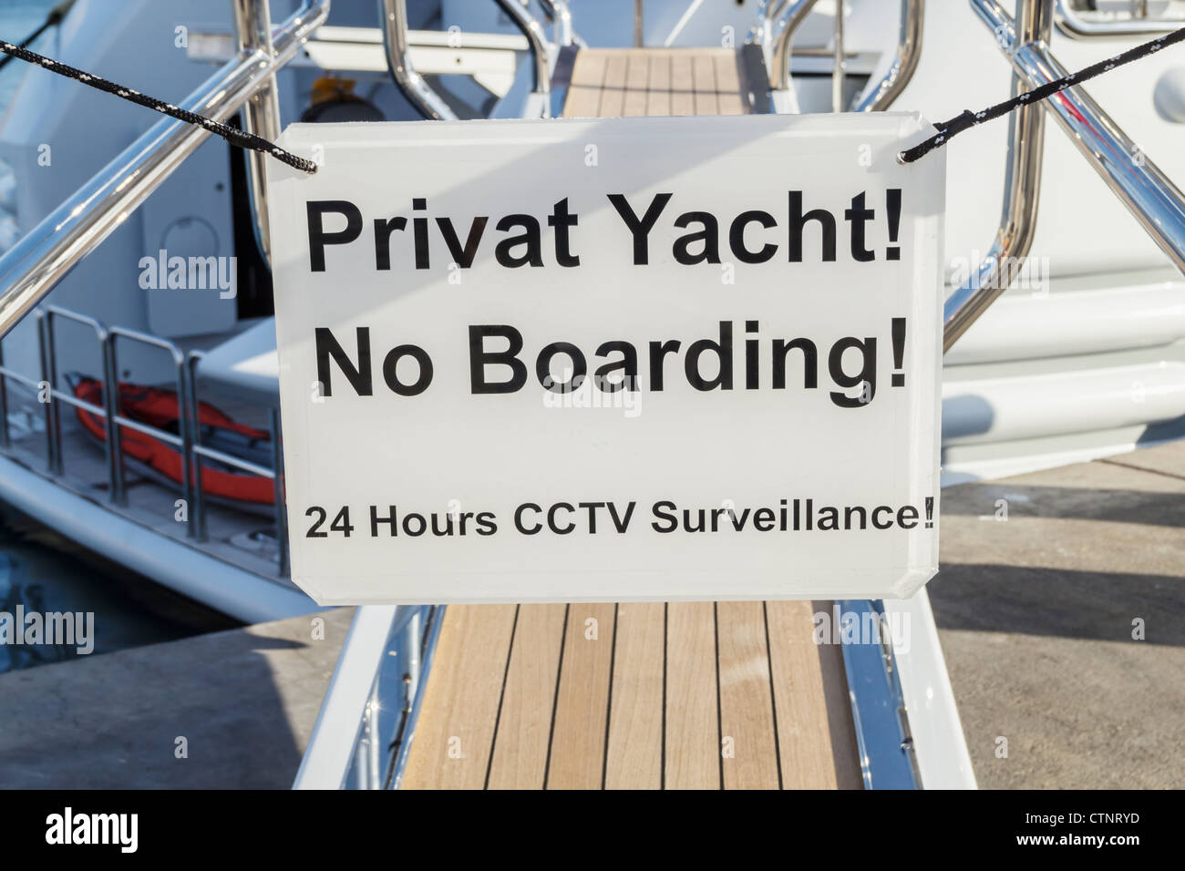 "Privat yacht no boarding" sign on luxury yacht in Spain Stock Photo