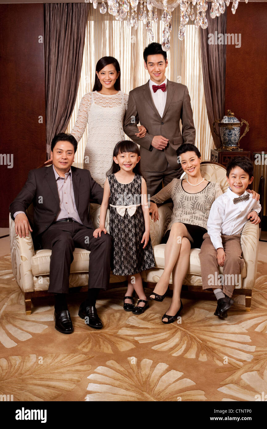 Portrait of a big family in a luxurious room Stock Photo - Alamy
