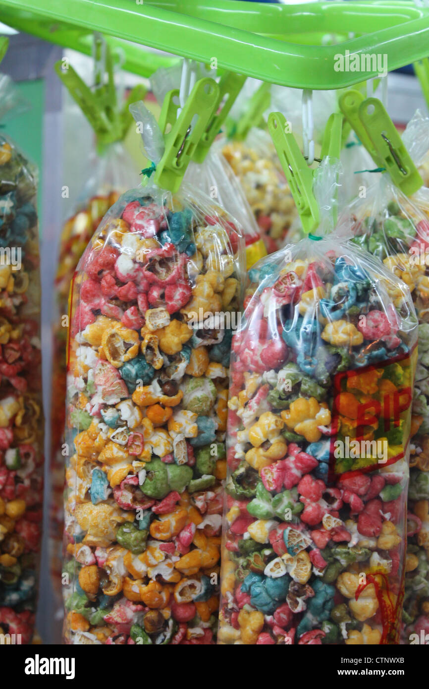 Packaged coloured popcorn, Funchal, Madeira Stock Photo
