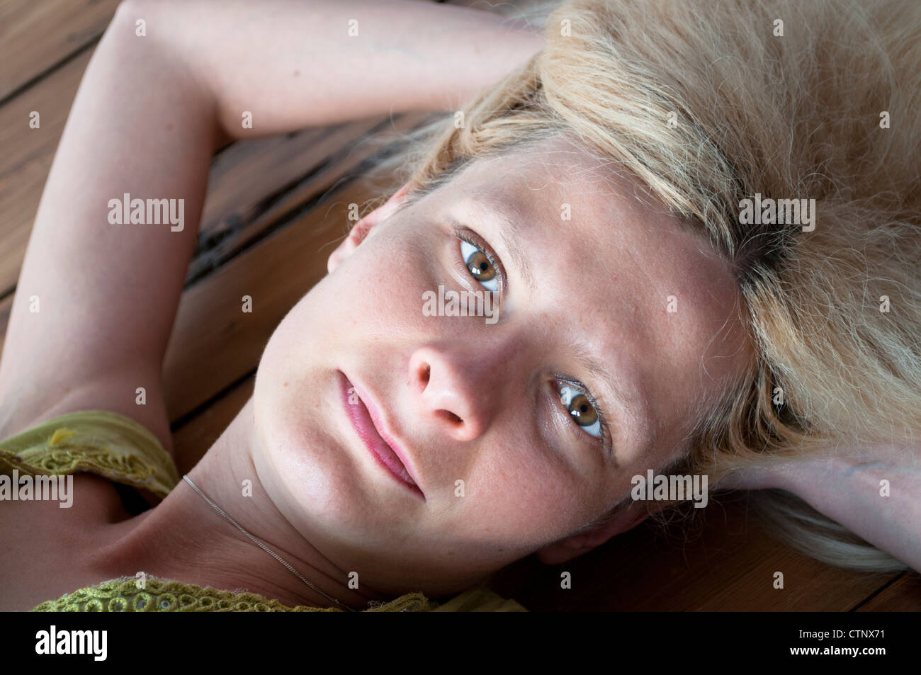 Young woman looking at camera Stock Photo