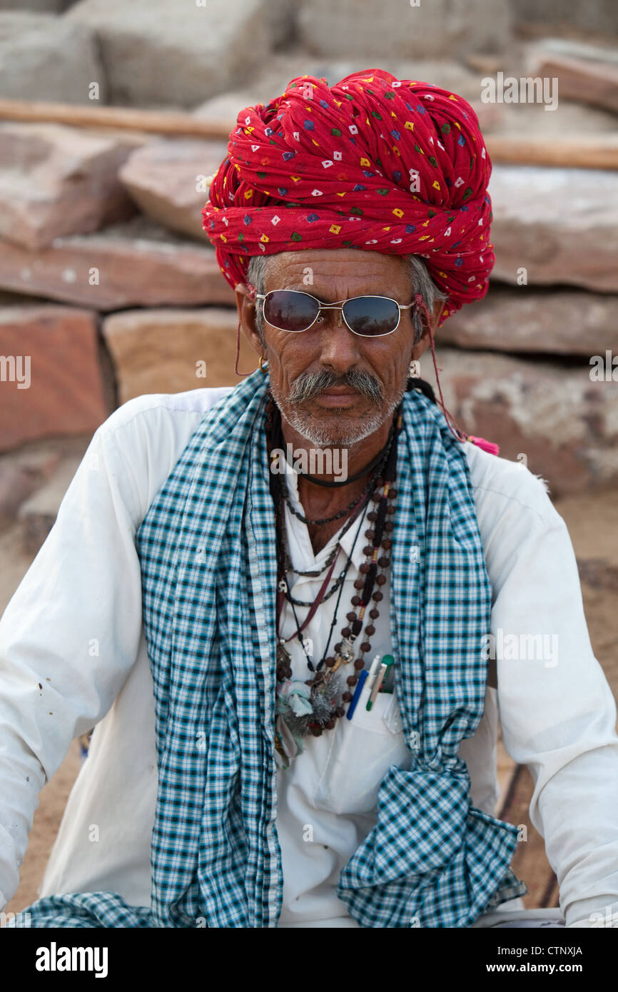 Indian man in turban posing for portrait in Rajasthan Stock Photo