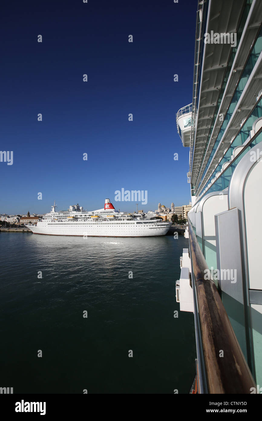 City of Cadiz, Spain. Side view of the P&O ship Ventura berthed in the Port of Cadiz with the Black Watch in the background. Stock Photo