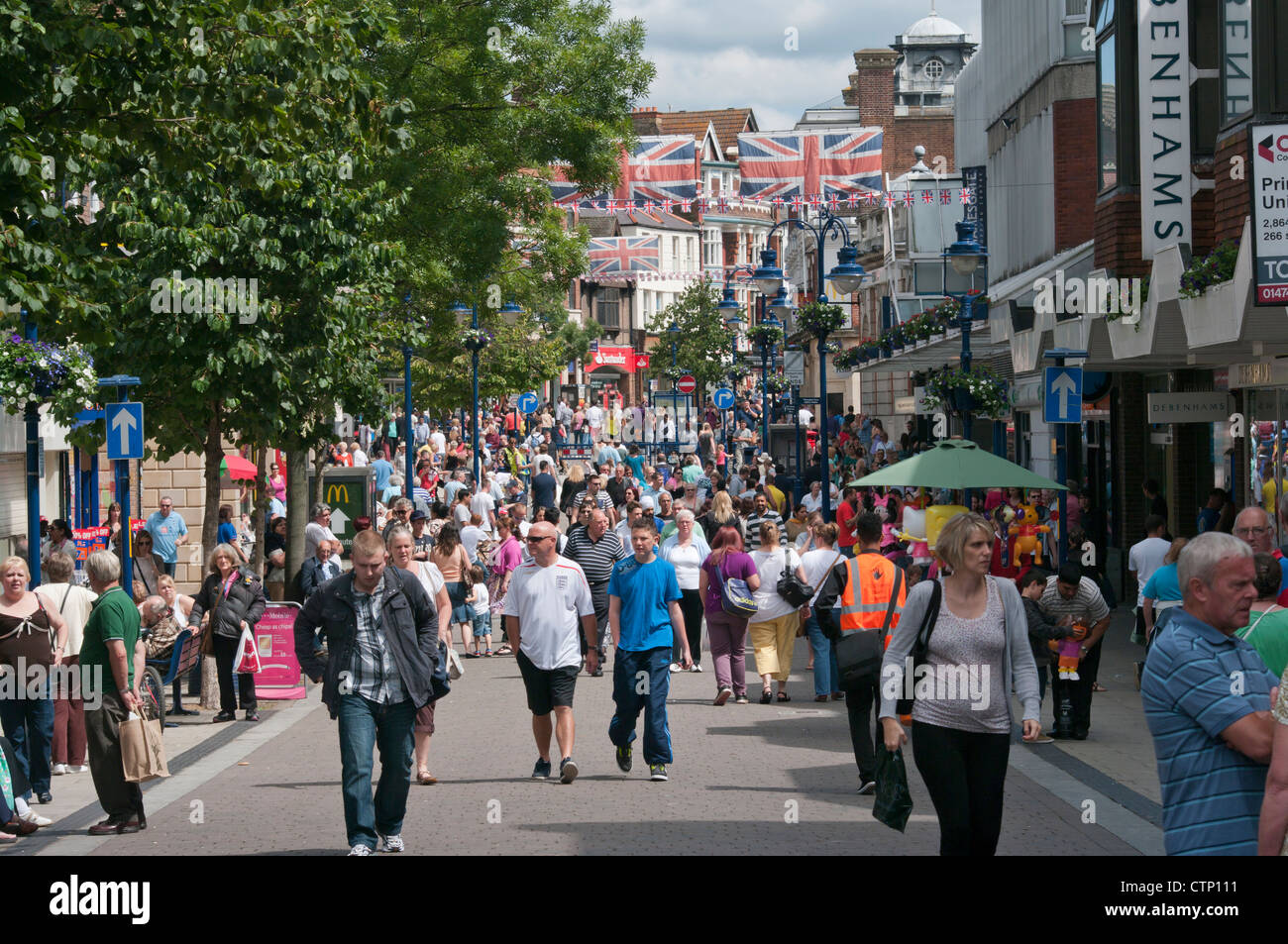Crowded Town Centre Busy With High Street Shoppers Shopping New Road Gravesend Kent UK Stock Photo