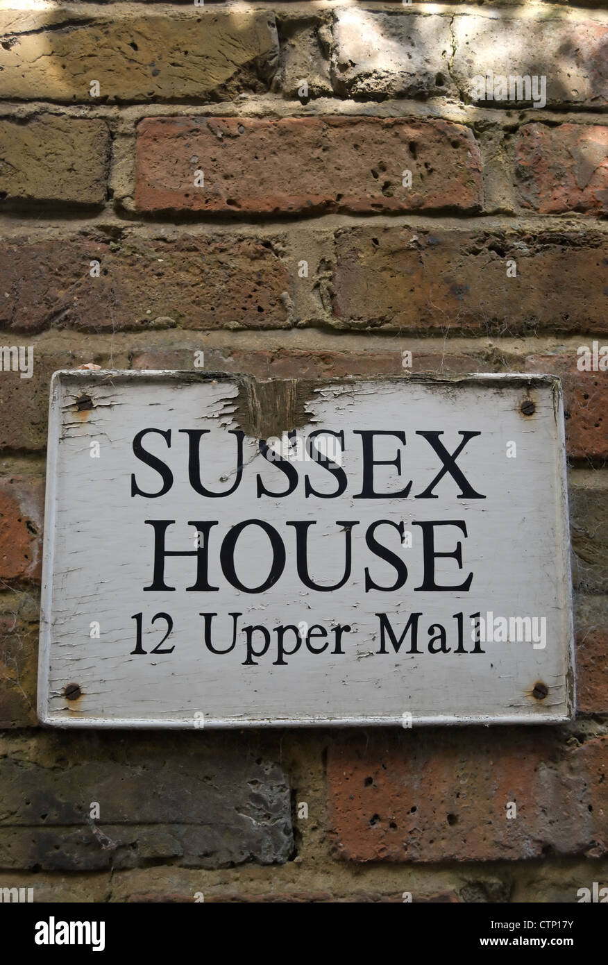 weathered wooden address board for sussex house, upper mall