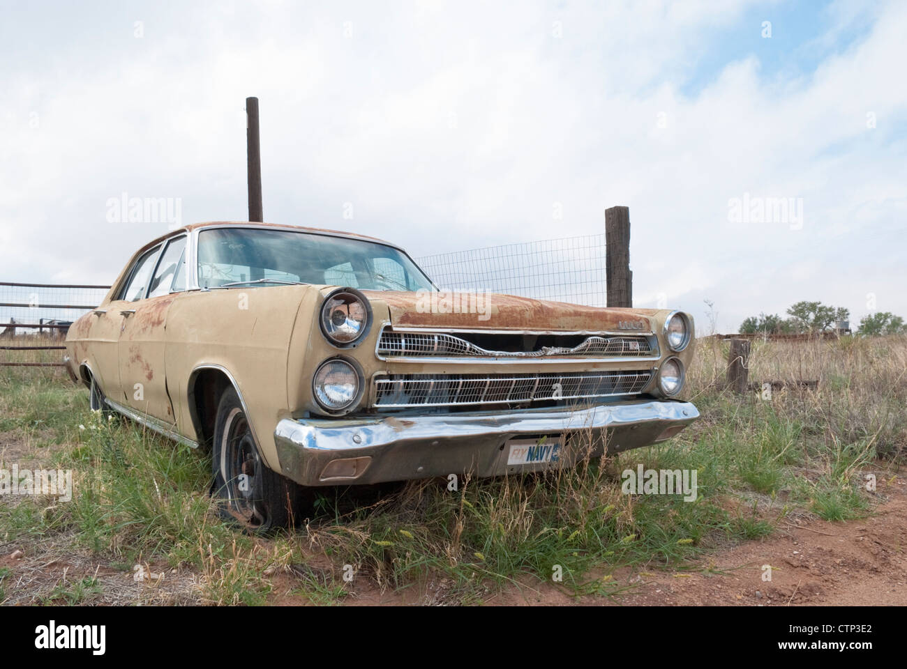 An old Ford Fairlane sits in a vacant lot in the mostly uninhabited rural town of Taiban, New Mexico. Stock Photo