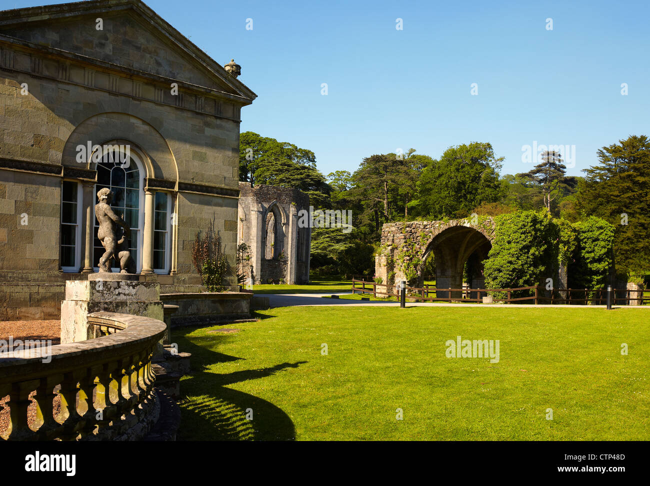 Margam Orangery and the ruins of Margam Abbey, Margam Park, Port Talbot, Wales, UK Stock Photo