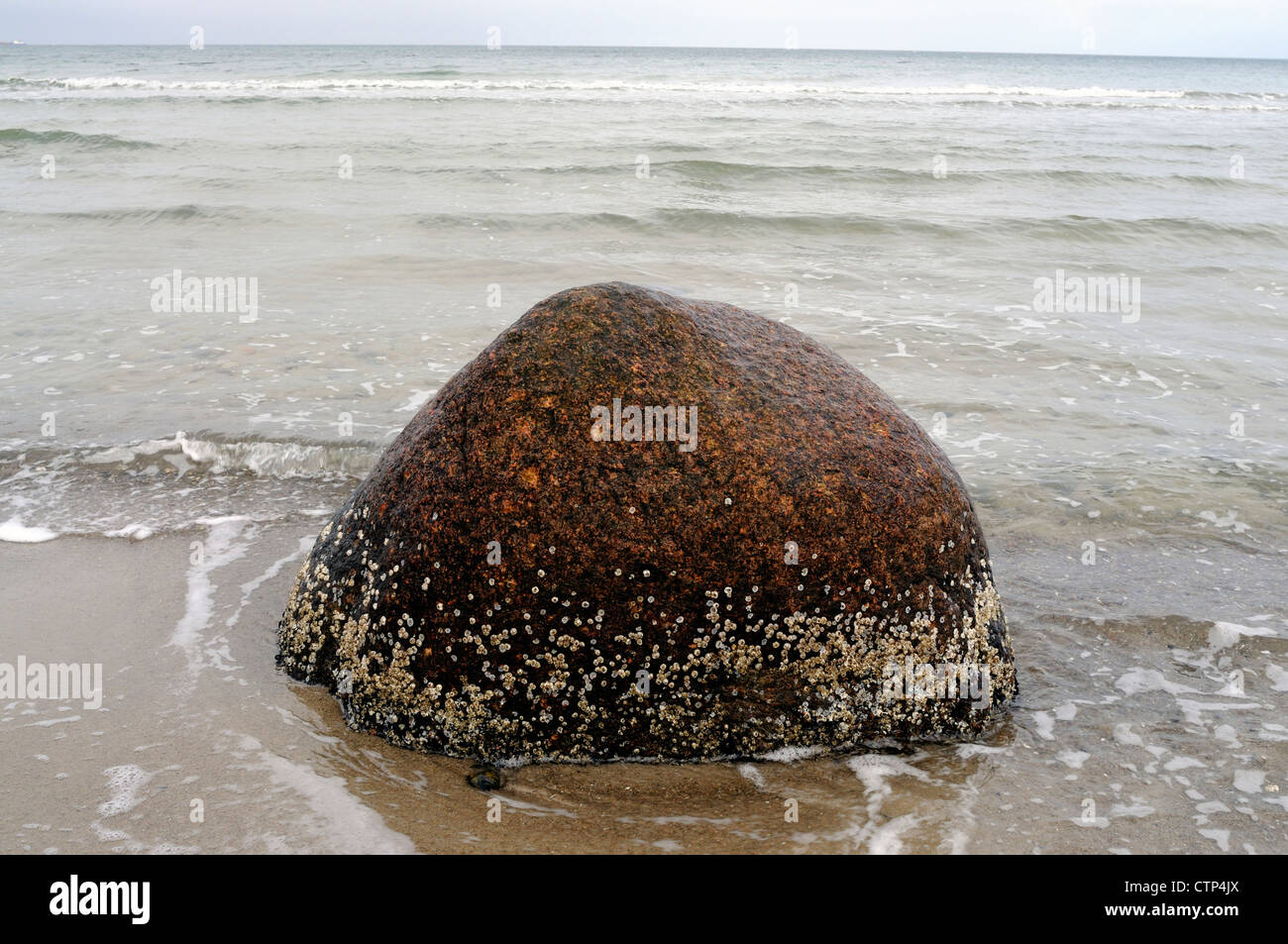 stone in ocean Stock Photo