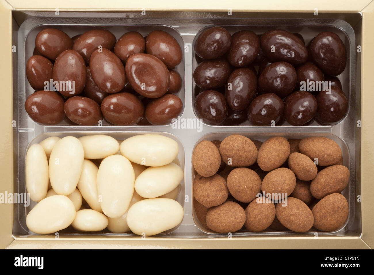 A Selection Box Of Chocolate Coated Brazil Nuts Studio Shot