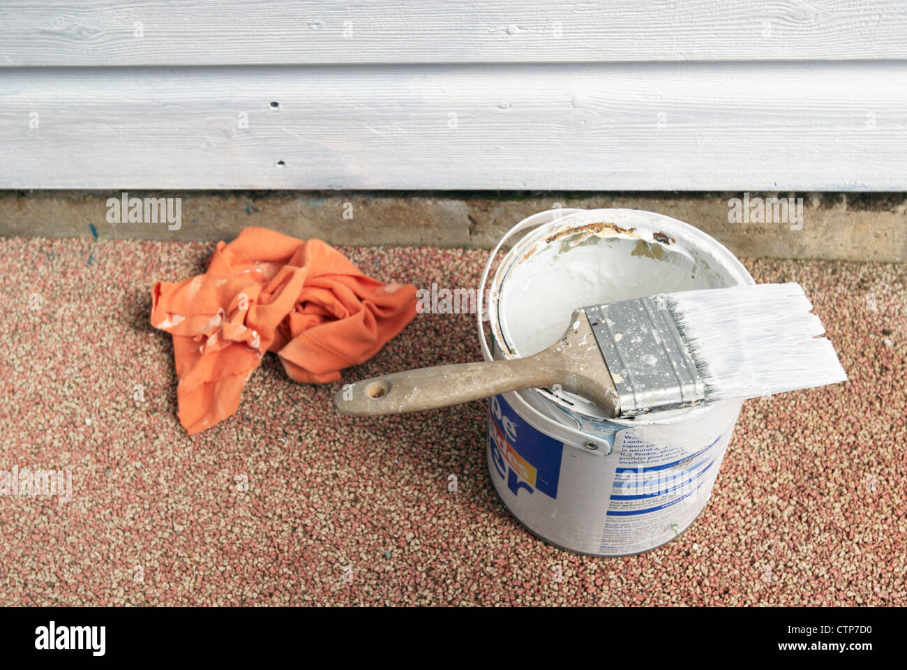 Open can of paint and paintbrush Stock Photo Alamy