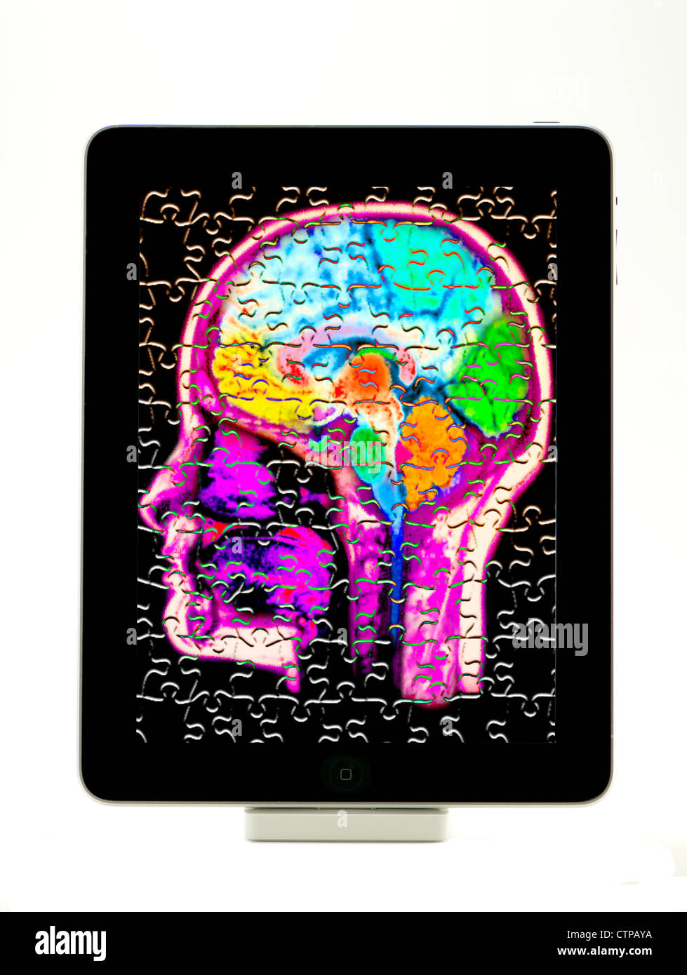 Tablet computer with an illustration of the human brain Stock Photo