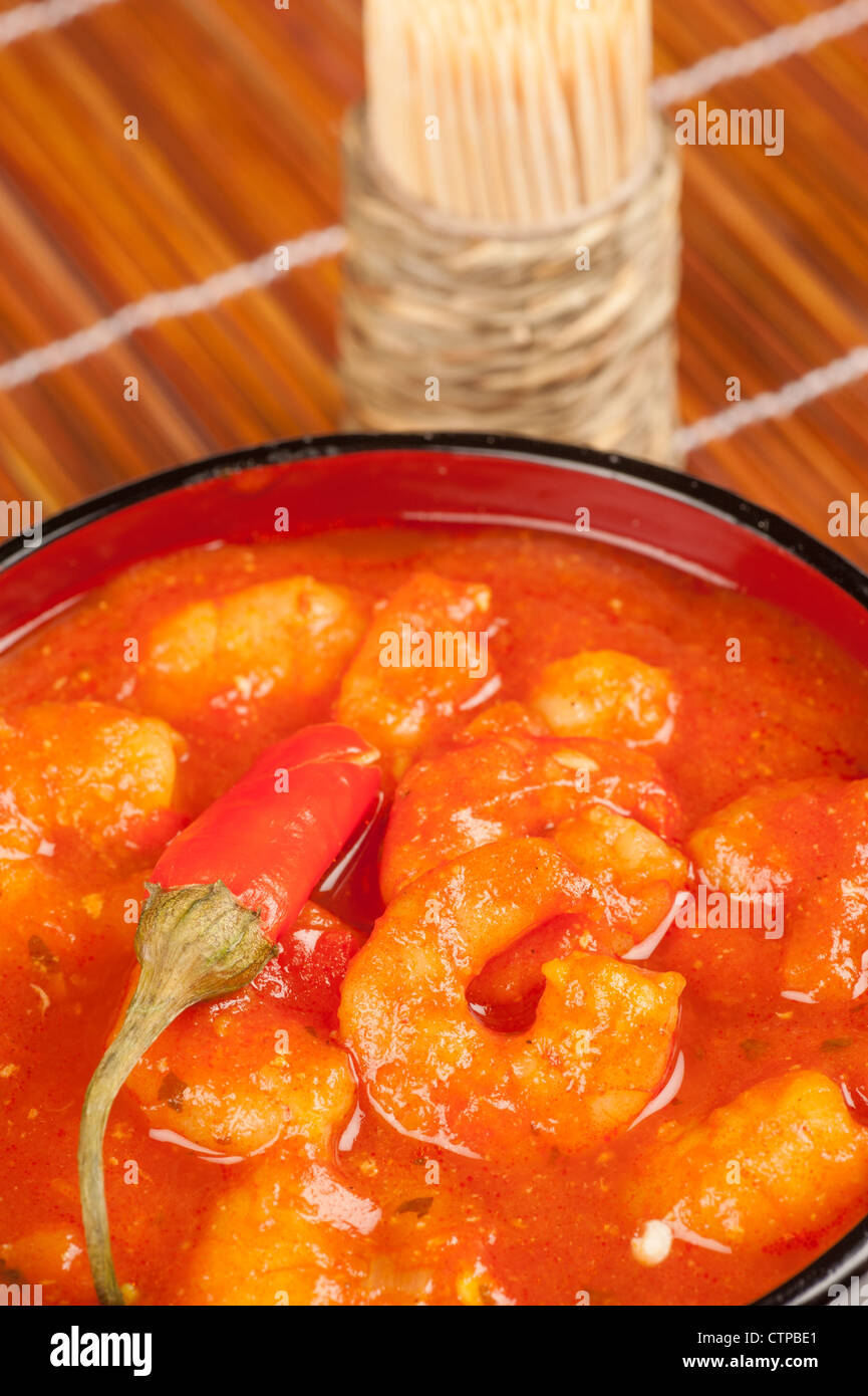 Bowl wiht a red hot Asian shrimp stew Stock Photo Alamy