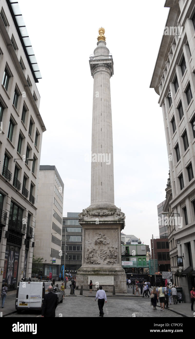 27/07/12 The Monument to the Great Fire of London, more commonly known simply as the Monument, is a stone Roman Doric column in Stock Photo