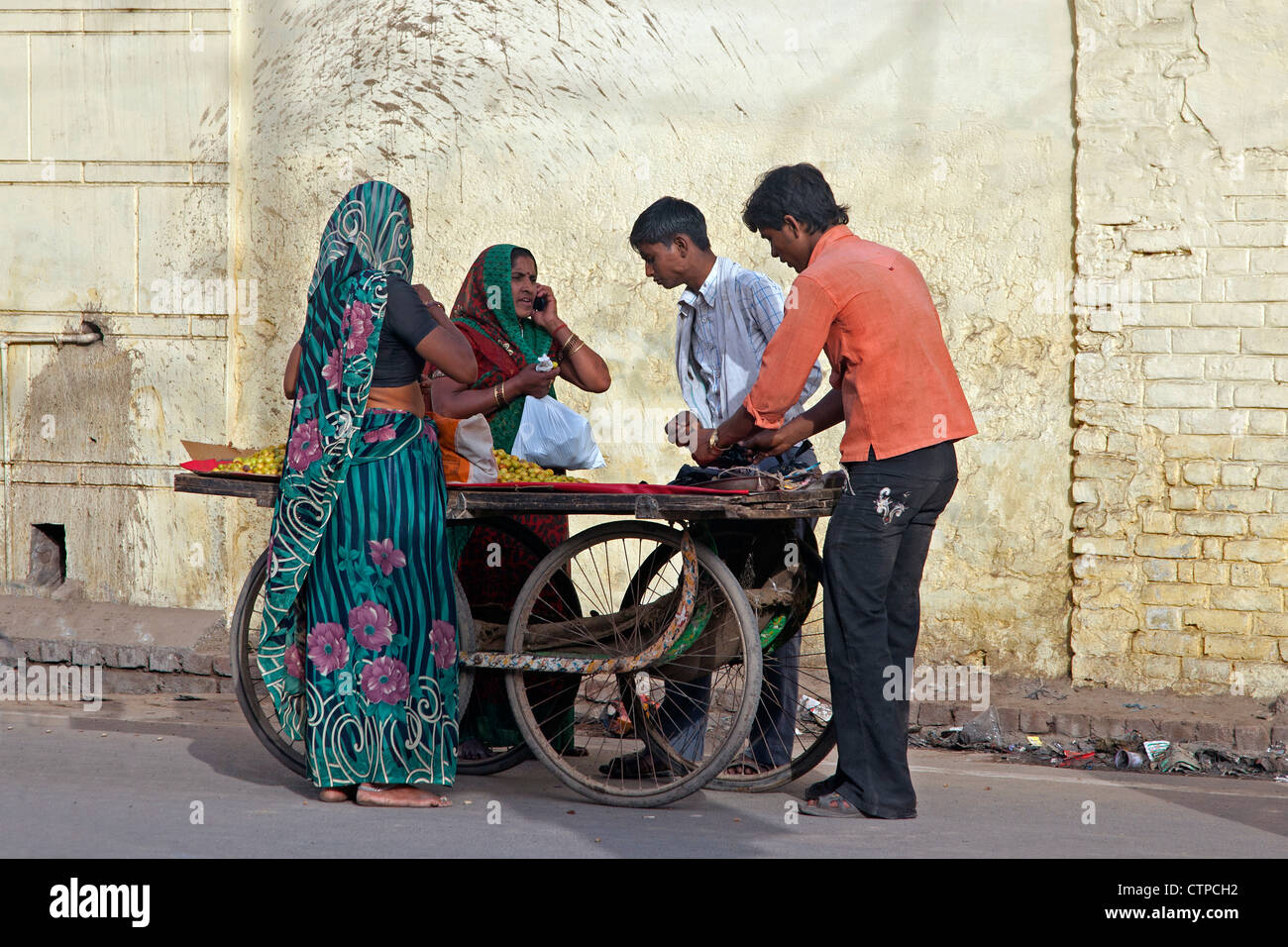 Female street vendor mobile hi-res stock photography and images - Alamy