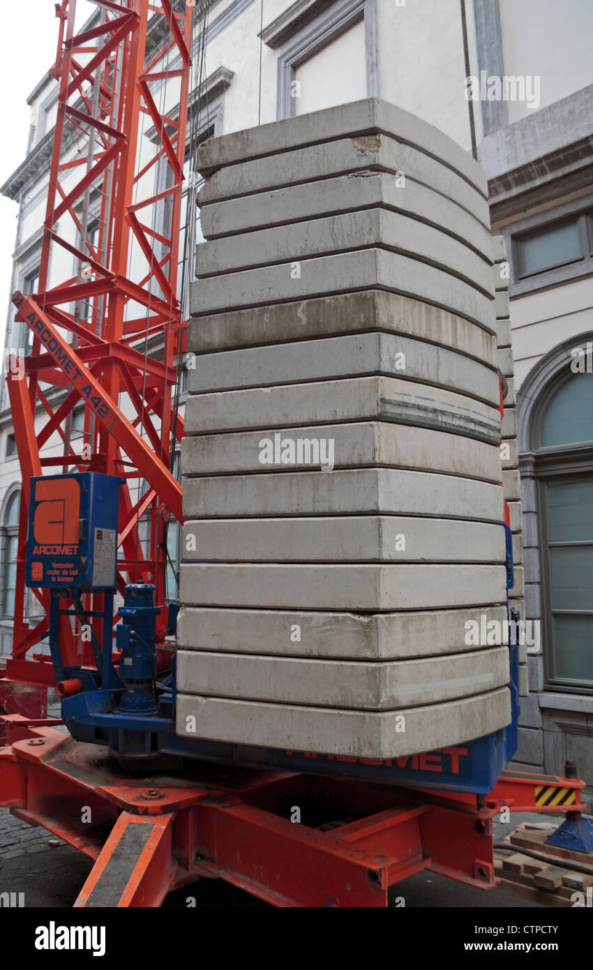 The concrete slabs making up the counterweight on a small tower crane in Mons, Wallonia
