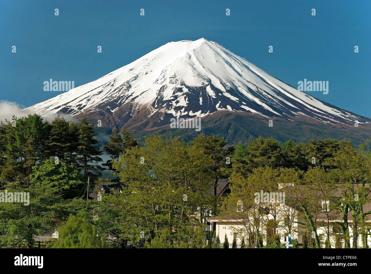 Mount Fuji from Kawaguchiko lake in Japan during the sunrise with beautiful blue sky Stock Photo