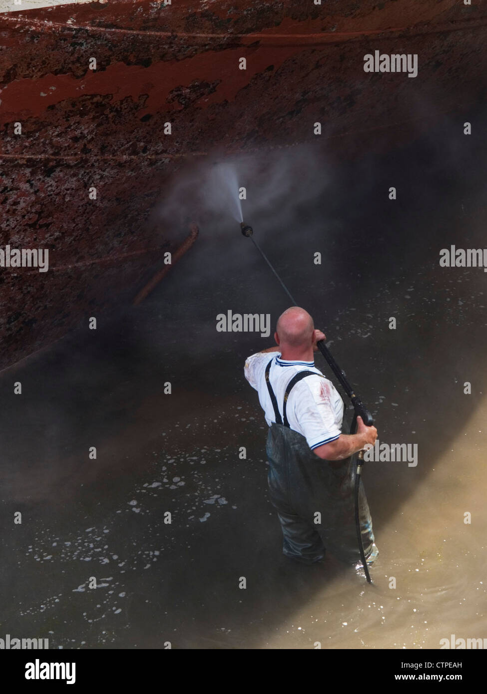 Power washing boat hull Stock Photo Alamy