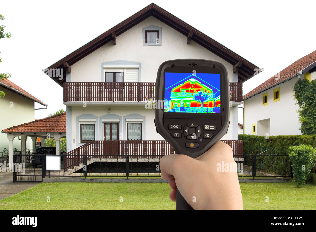 Detecting Heat Loss at the House With Infrared Thermal Camera Stock Photo