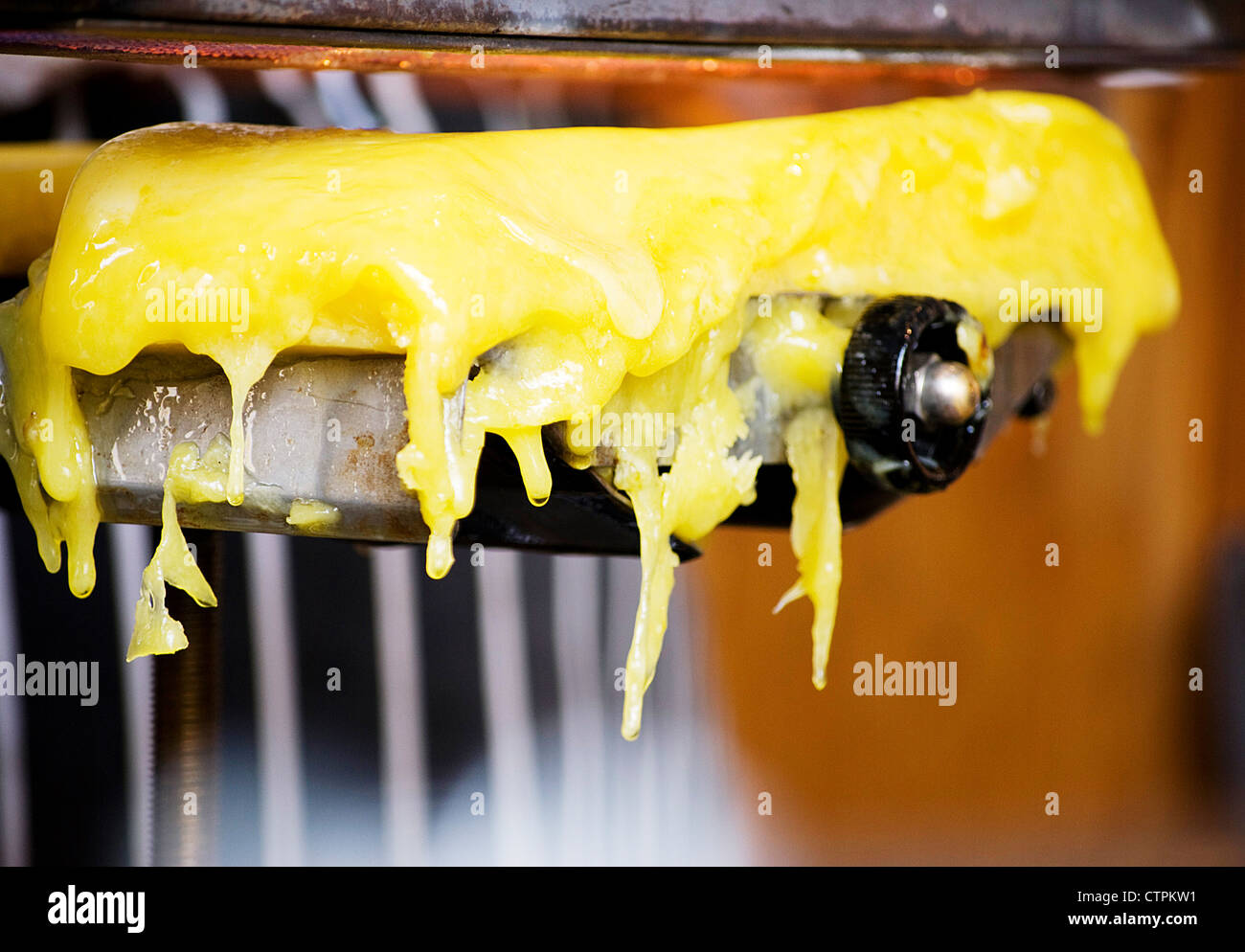 grill melting cheddar cheese for meals close up Stock Photo Alamy