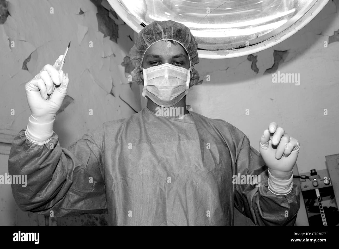 Shaded surgeon forget details of coming difficult surgery Stock Photo