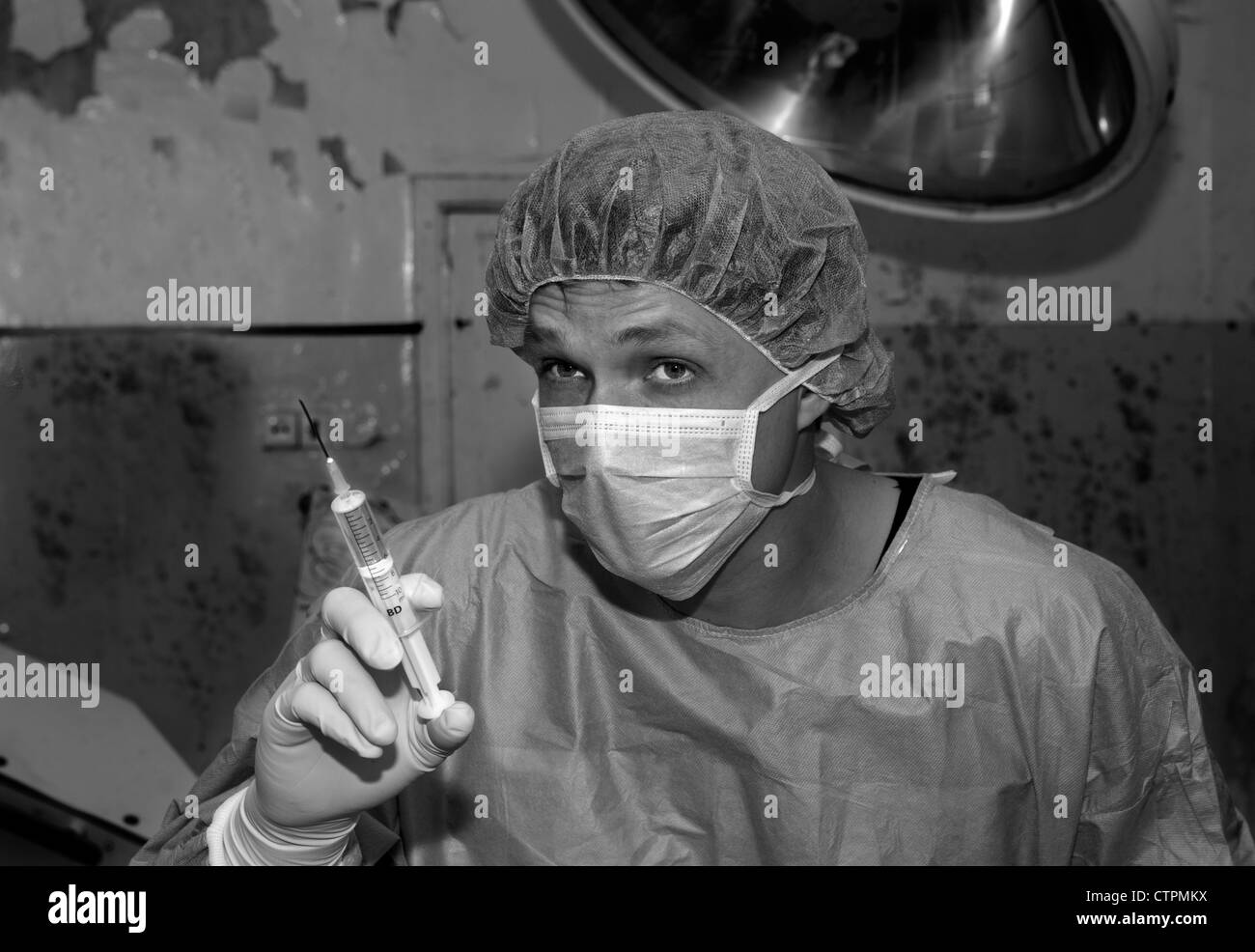 Shaded surgeon making thoughts before coming difficult surgery Stock Photo