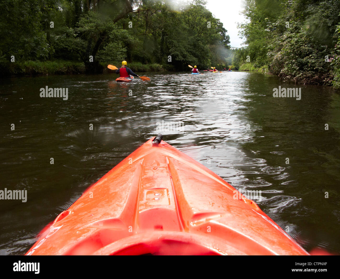 group canoeing on the river lagan in belfast in the uk Stock Photo
