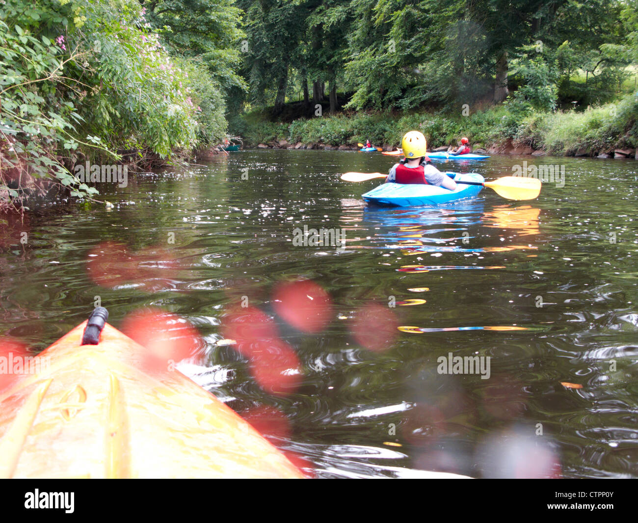 group canoeing on the river lagan in belfast in the uk Stock Photo