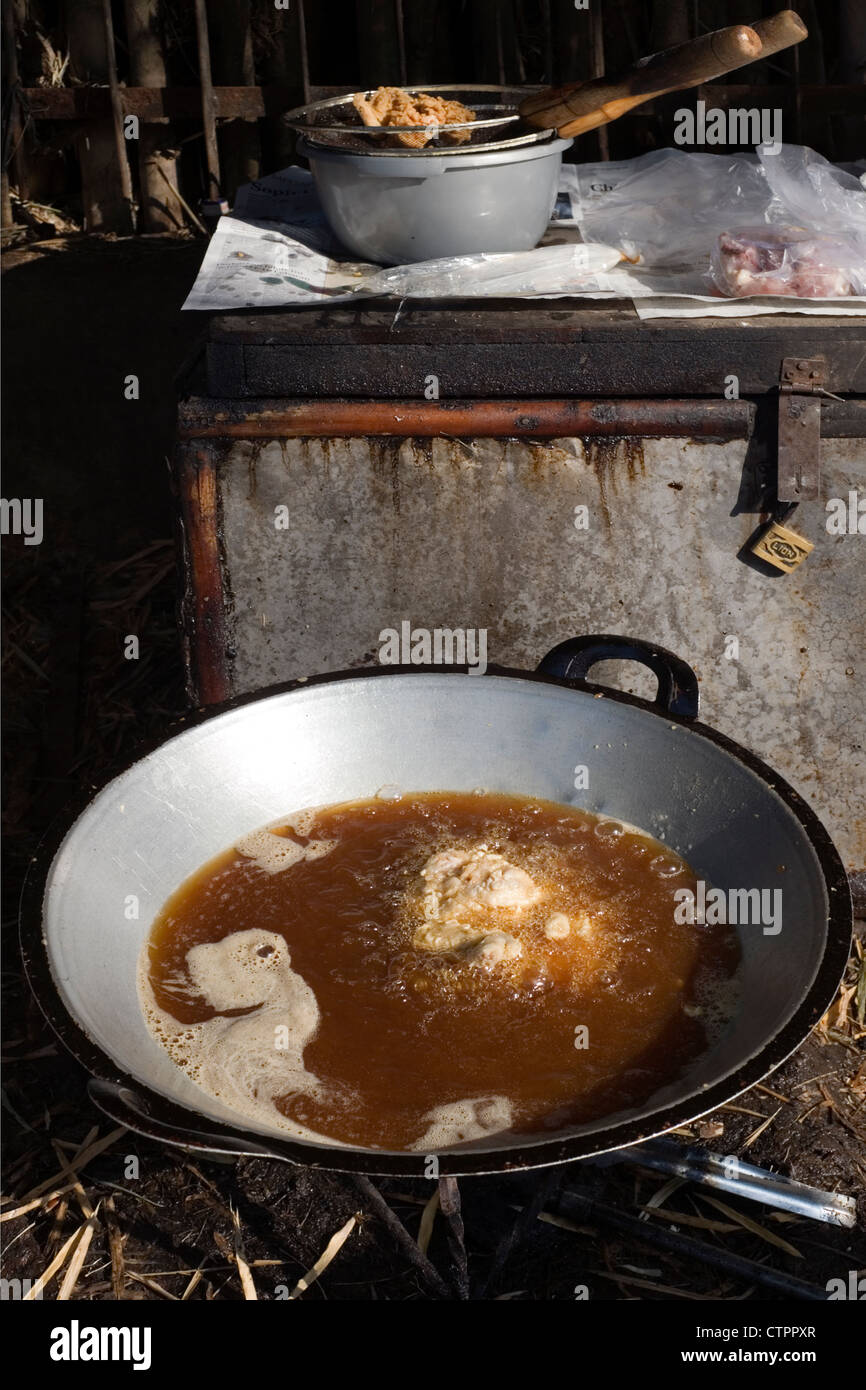 food cooking in hot oil in wok at small daily local market jakarta java  indonesia Stock Photo - Alamy