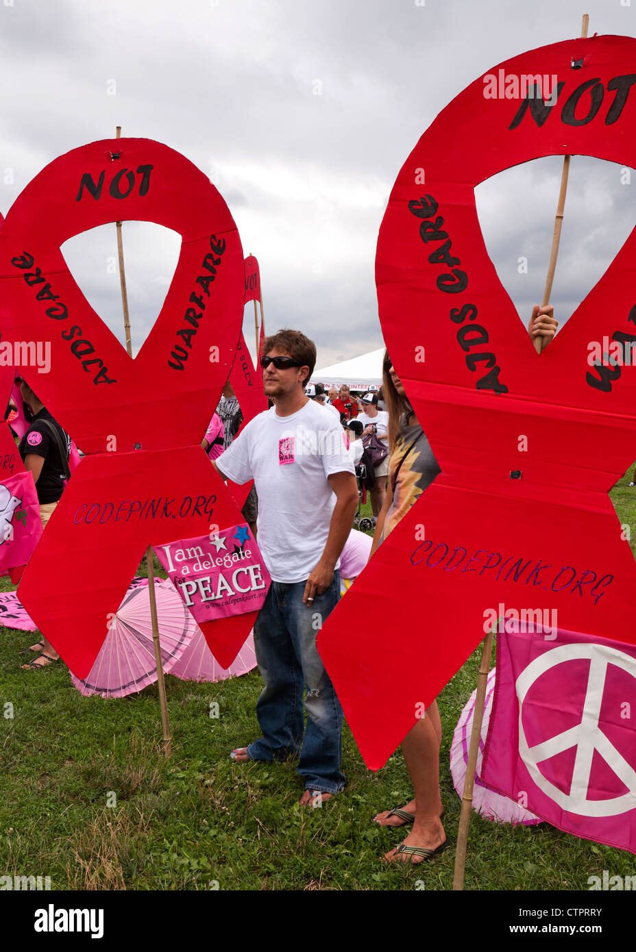 People holding HIV AIDS awareness ribbons - July 22, 2012, Washington, DC USA Stock Photo