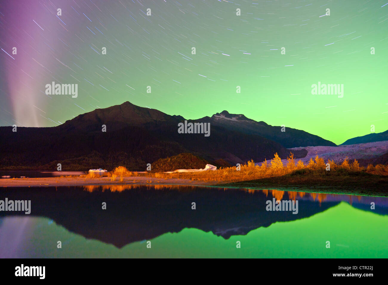 Northern Lights in the sky above the terminus of the Mendenhall Glacier,  Juneau, Southeast Alaska, Autumn Stock Photo