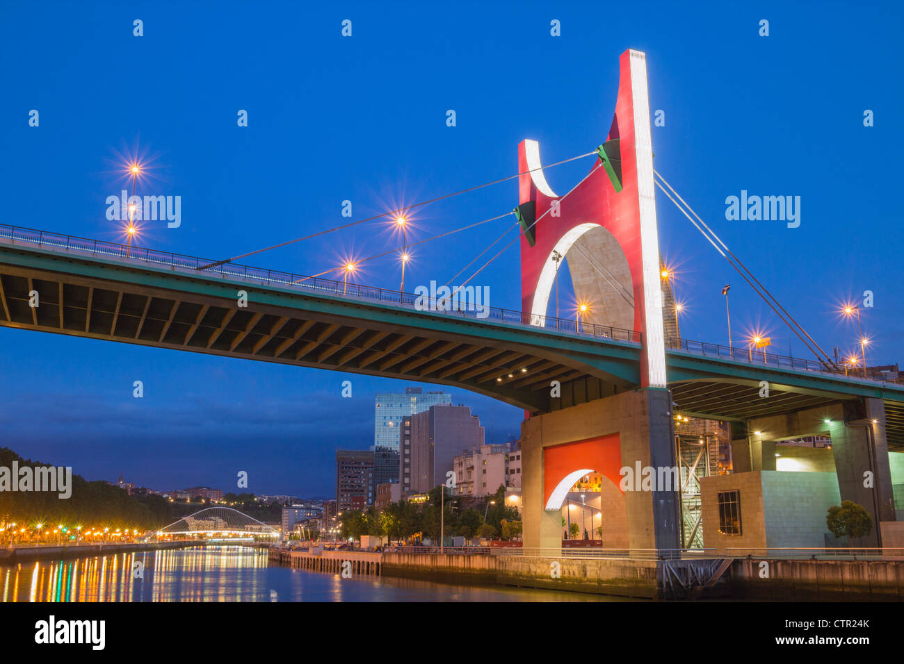 La Salve bridge (Zubizuri bridge in distance) in Bilbao, Basque Country, Spain Stock Photo