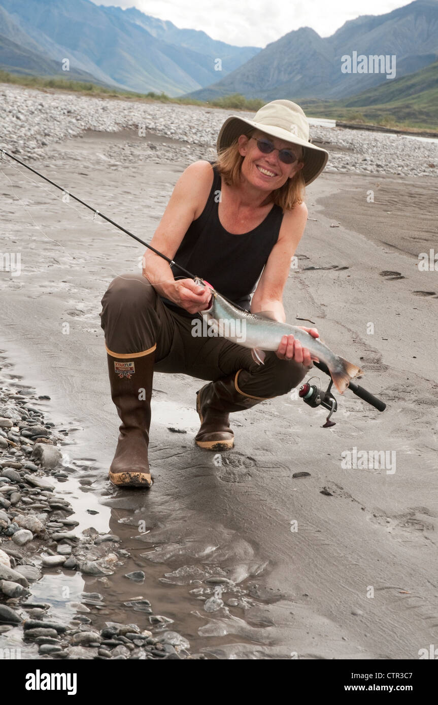 Mature fisherman posing fishing rod hi-res stock photography and images -  Alamy