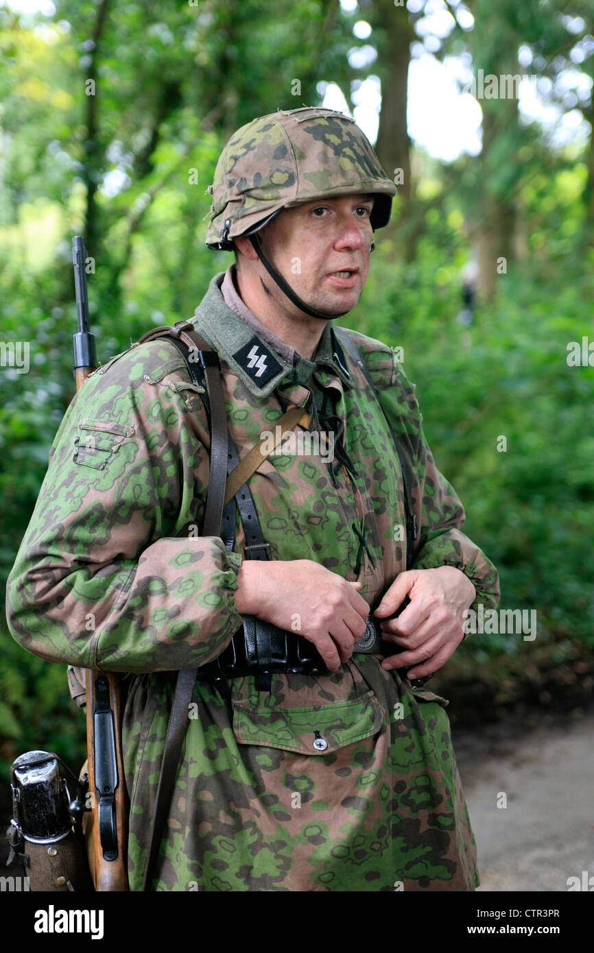 Actor dressed as Waffen-SS soldiers at a WW2 reenactment weekend Stock Photo
