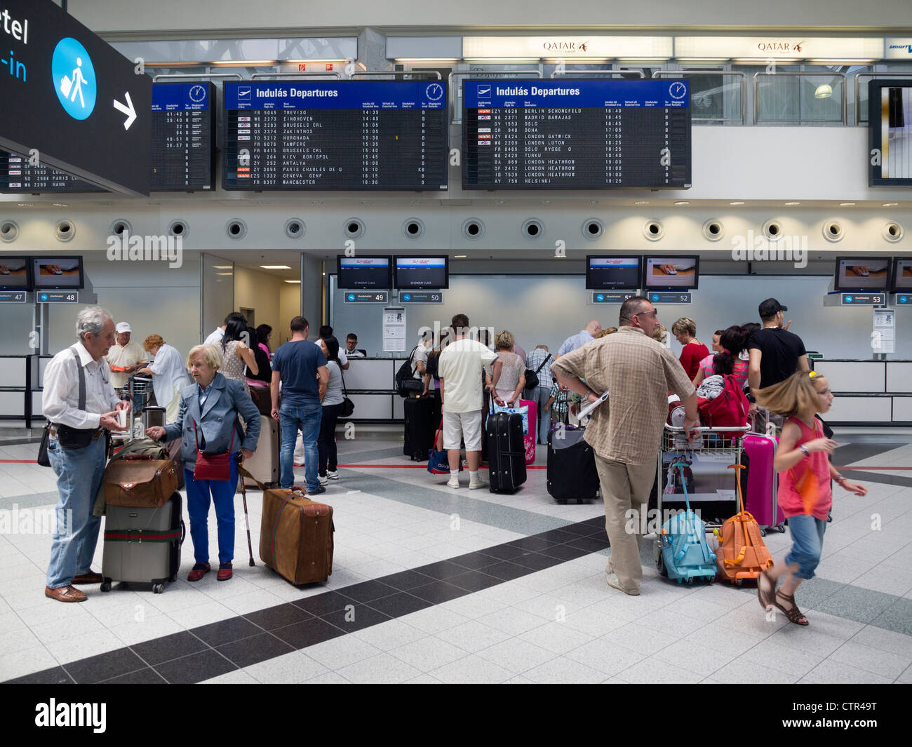Passengers in Budapest Ferenc Liszt international airport terminal 2b interior, Hungary, Eastern Europe Stock Photo