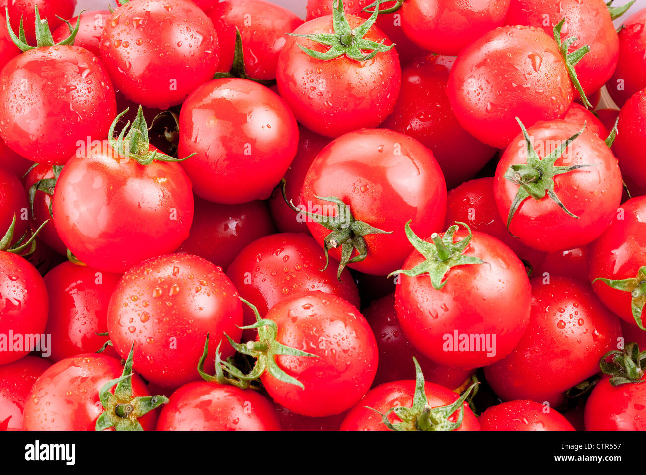Multitude of ripe tomatoes Stock Photo