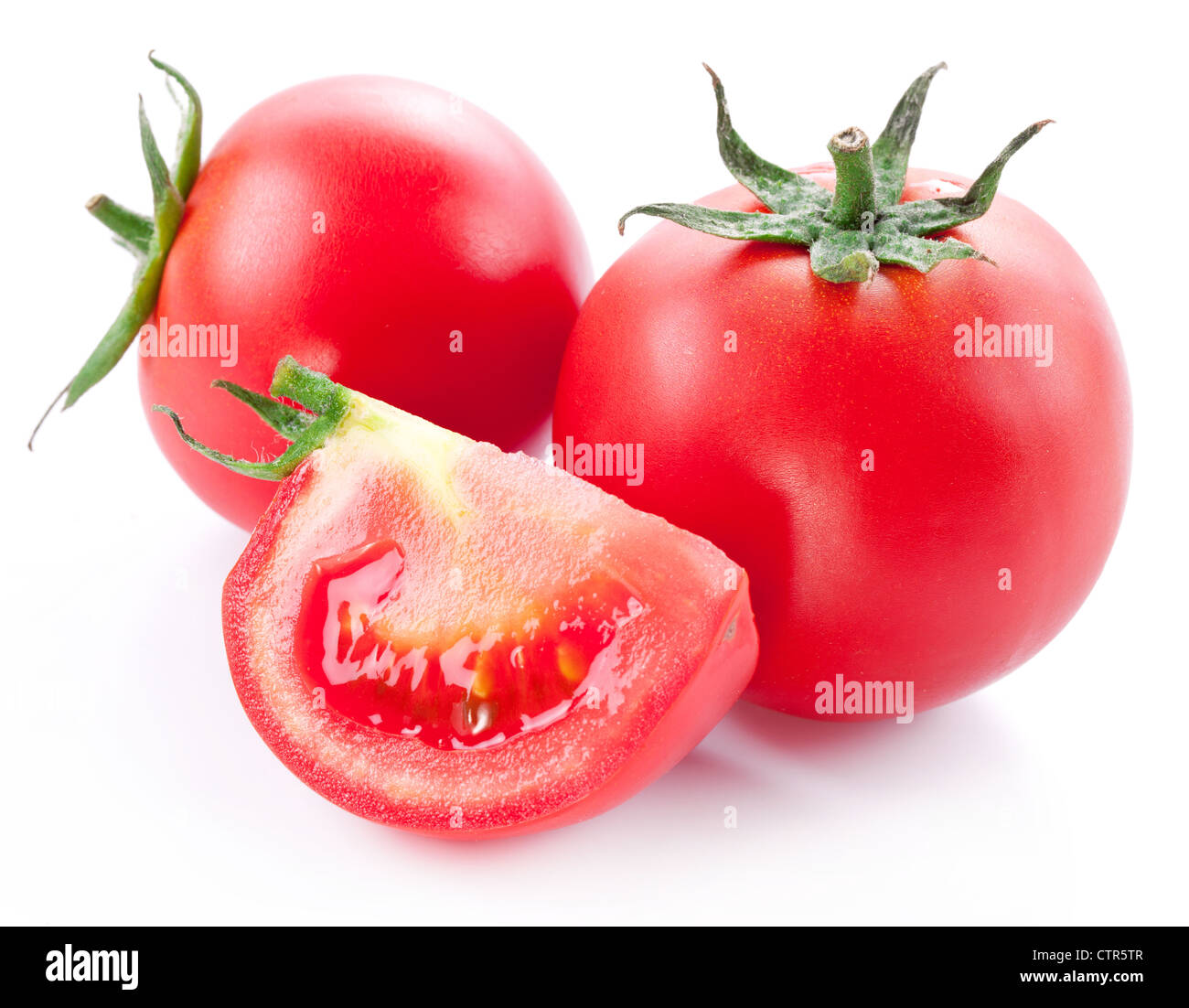 Tomatoes on a white background Stock Photo - Alamy
