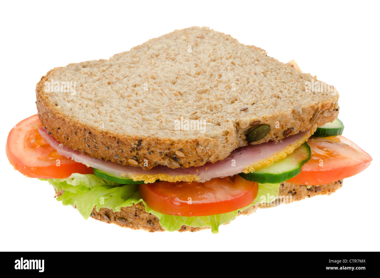 Fresh ham and salad sandwich with granary bread - studio shot with a white background Stock Photo