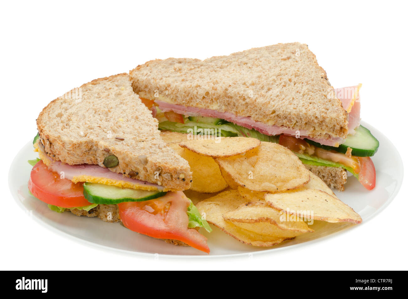 Ham and salad sandwich with fresh granary bread and potato chips