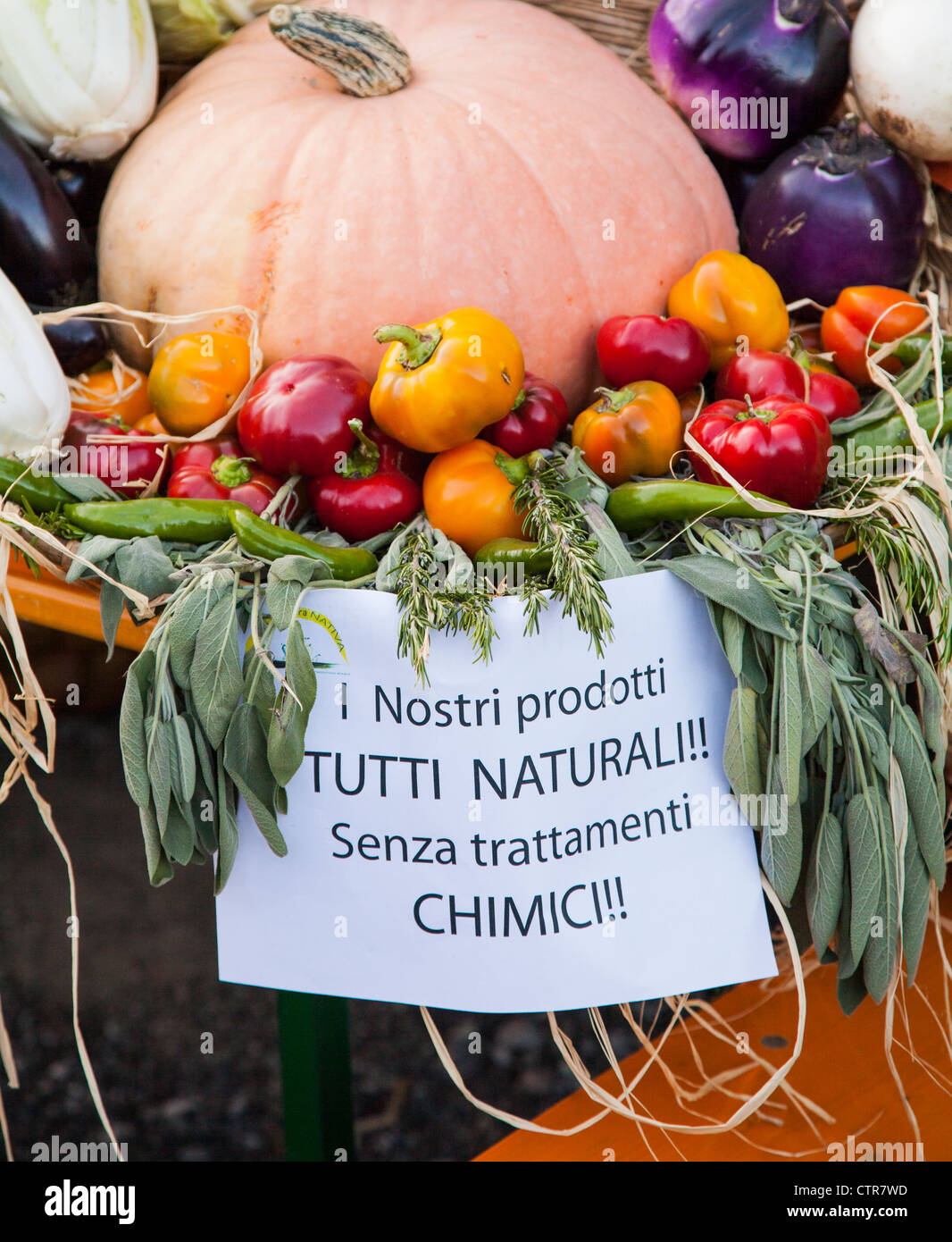 Market stall in Italy with sign saying that the foods are organically
