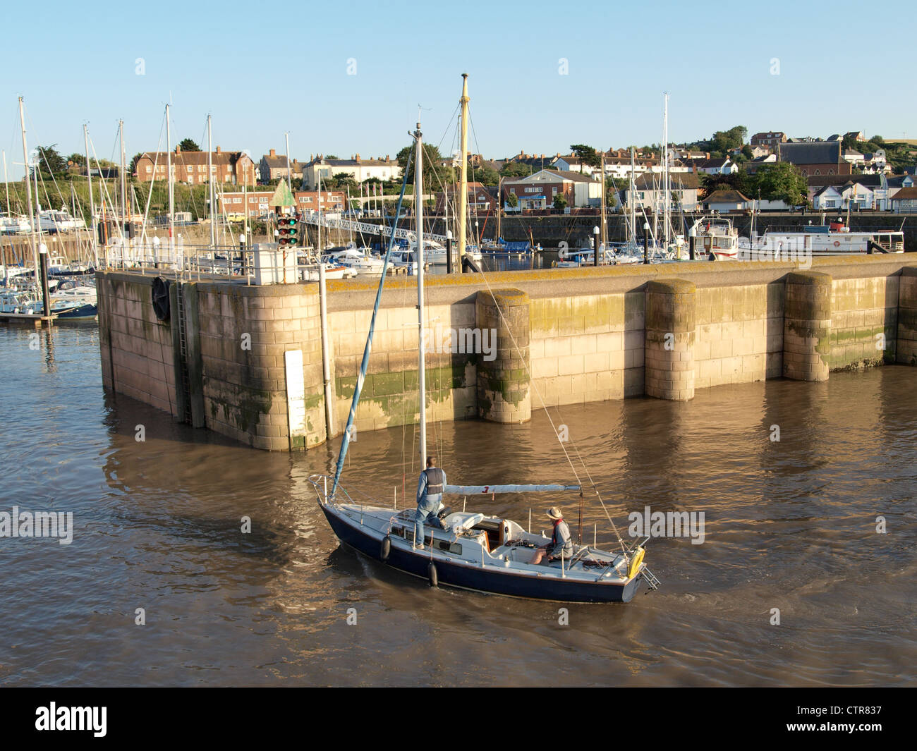 Small boat entering coastal hi-res stock photography and images - Alamy